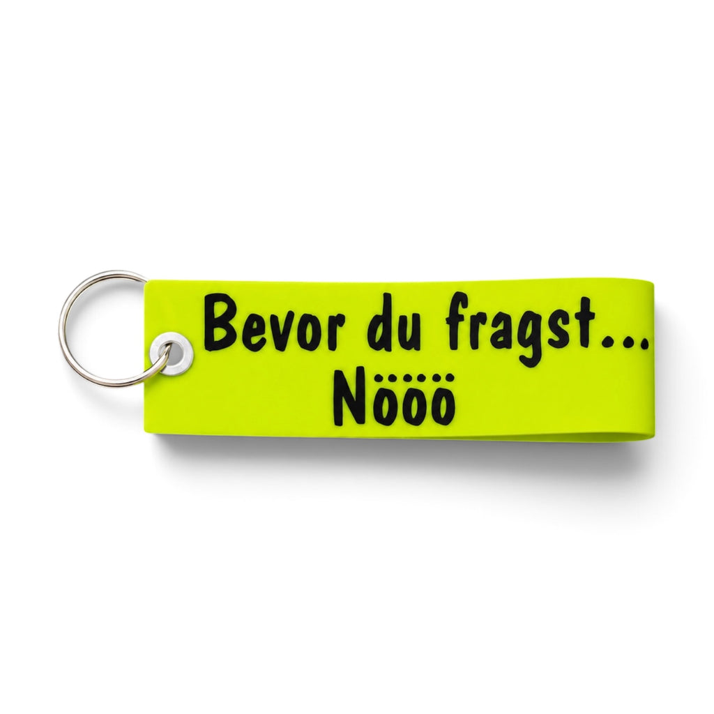 Neongelber Vinyl-Schlüsselanhänger mit Aufschrift „Bevor du fragst... Nööö“ und Metallring